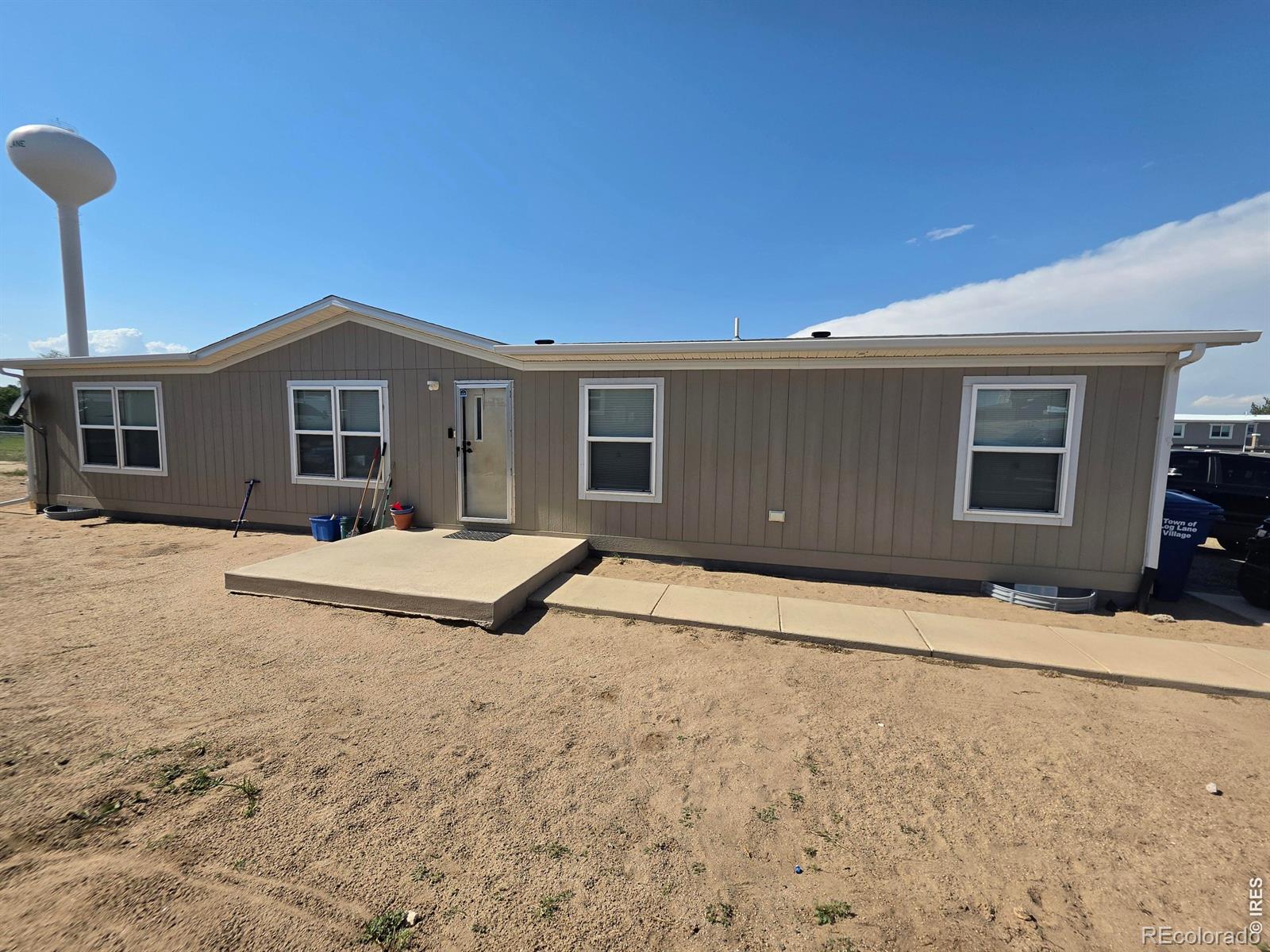 209 Larch Drive, Log Lane Village, CO 80705