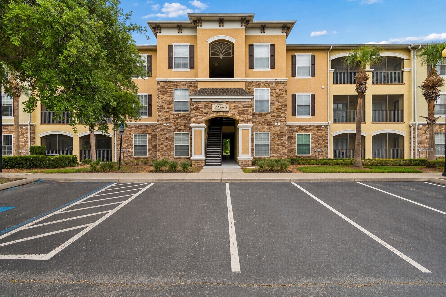 10203 COURTNEY PALMS BOULEVARD 103