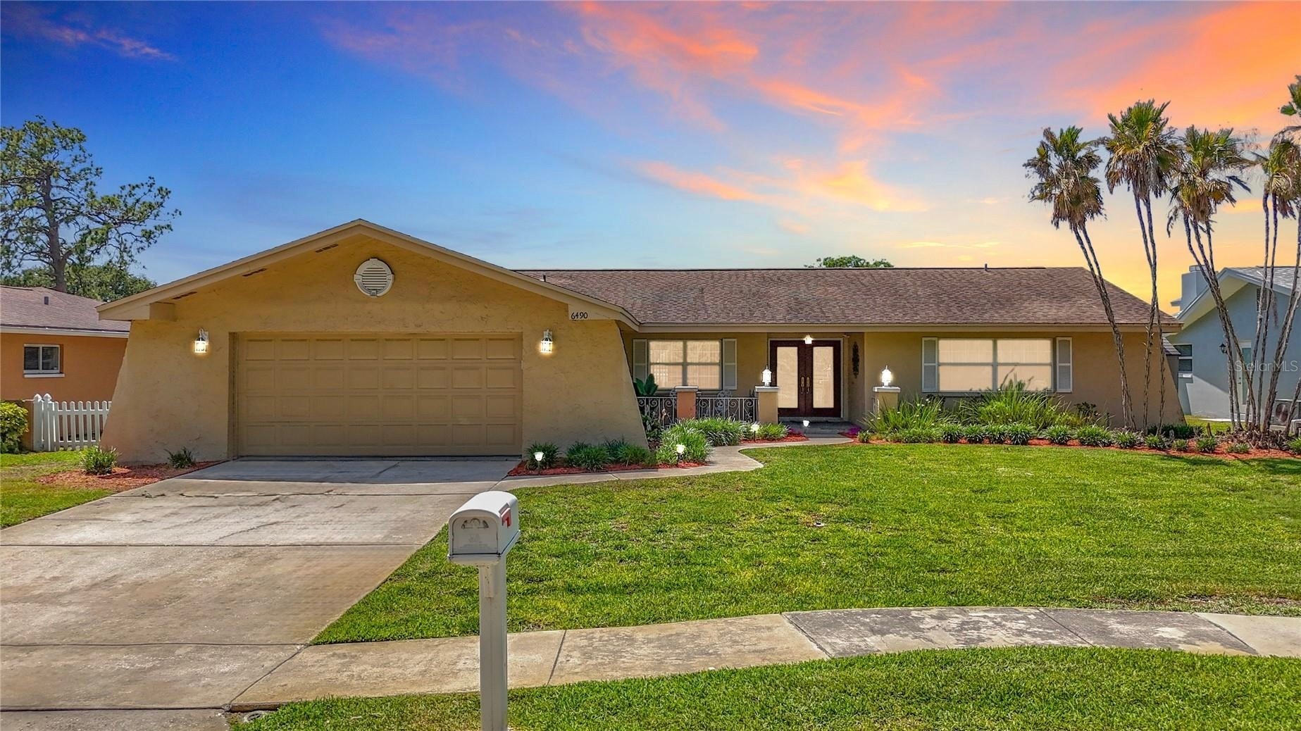 6490 BURNING TREE DRIVE