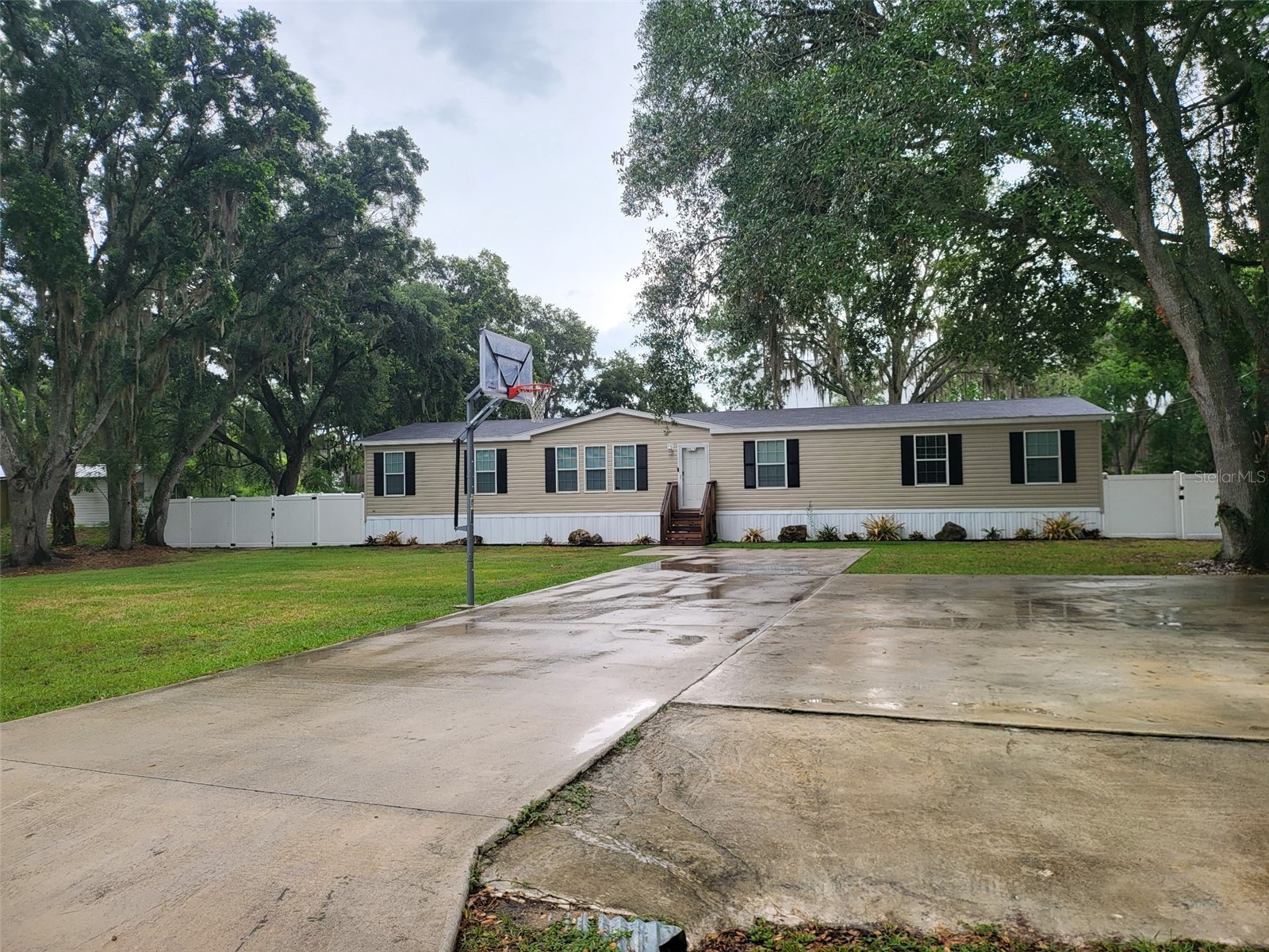 8915 HAMMOCK LOOP, POLK CITY, FL 33868
