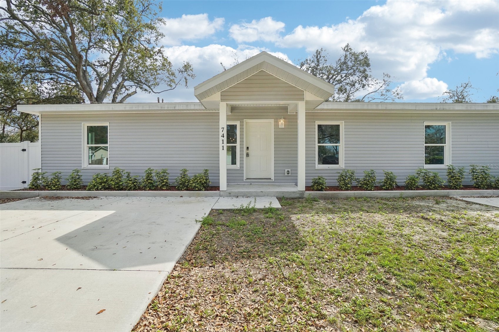 7409 & 7411 E 23RD AVENUE