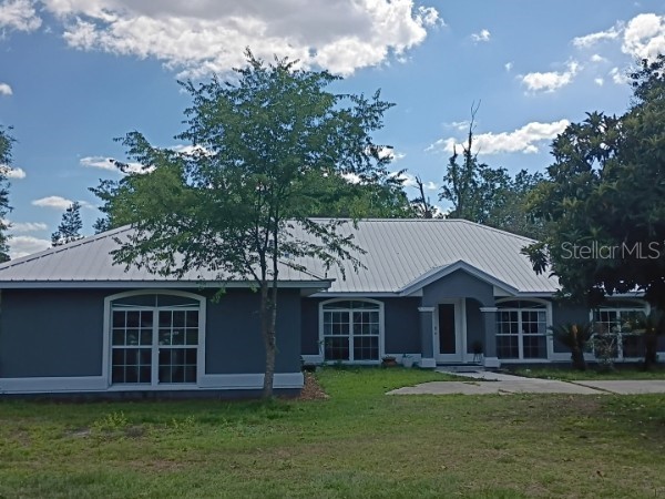 9128 NW 238TH STREET