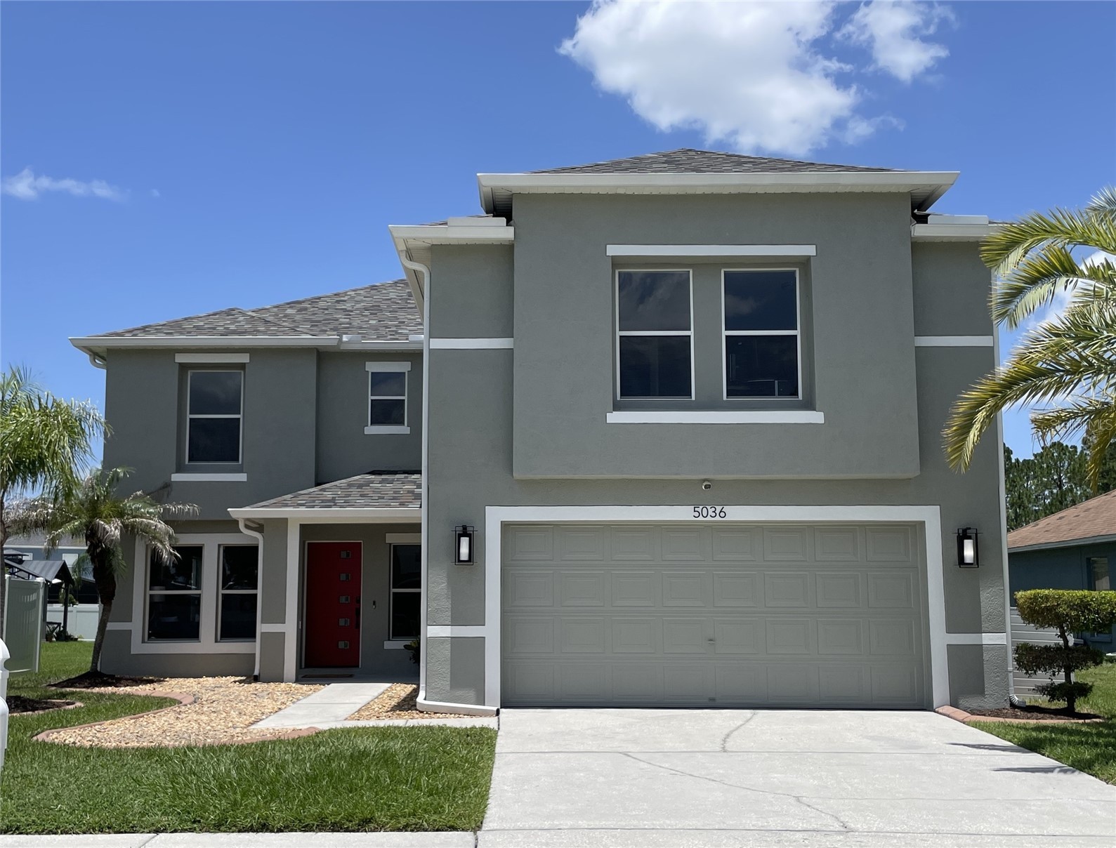 5036 WHISTLING PINES COURT